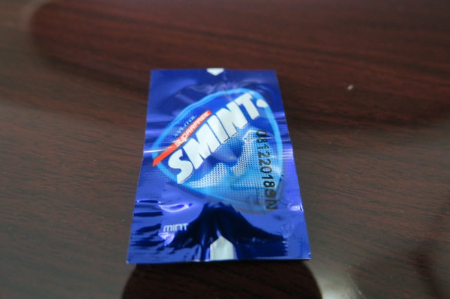 a blue package of chewing gum