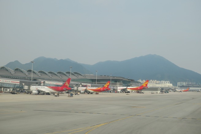 airplanes parked at an airport