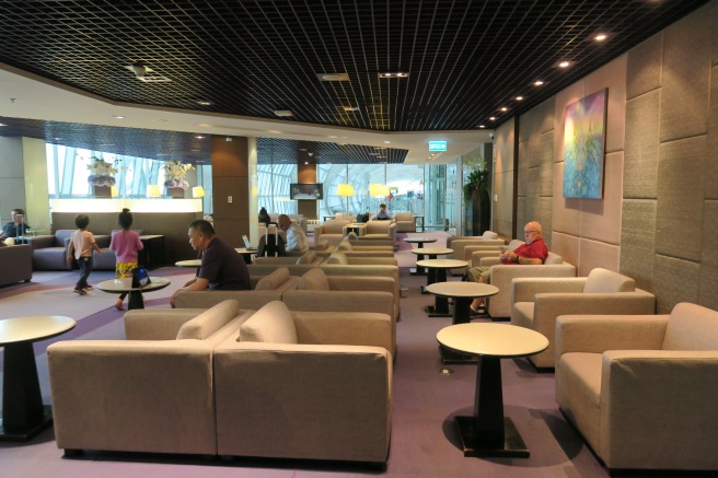 a group of people sitting in a lounge area