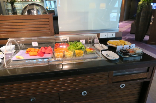 a buffet with fruit and vegetables