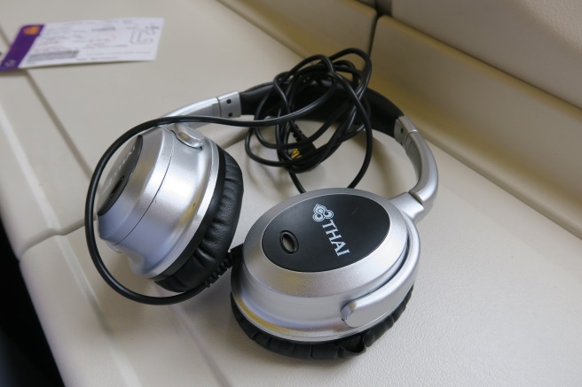 a pair of headphones with wires