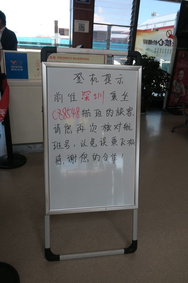 a sign with writing on it