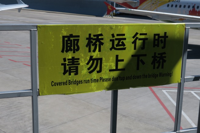 a yellow sign with black text