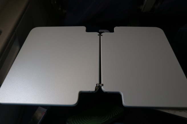 a white rectangular object with a hinge