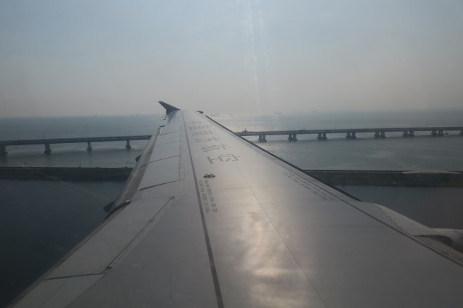 an airplane wing over water