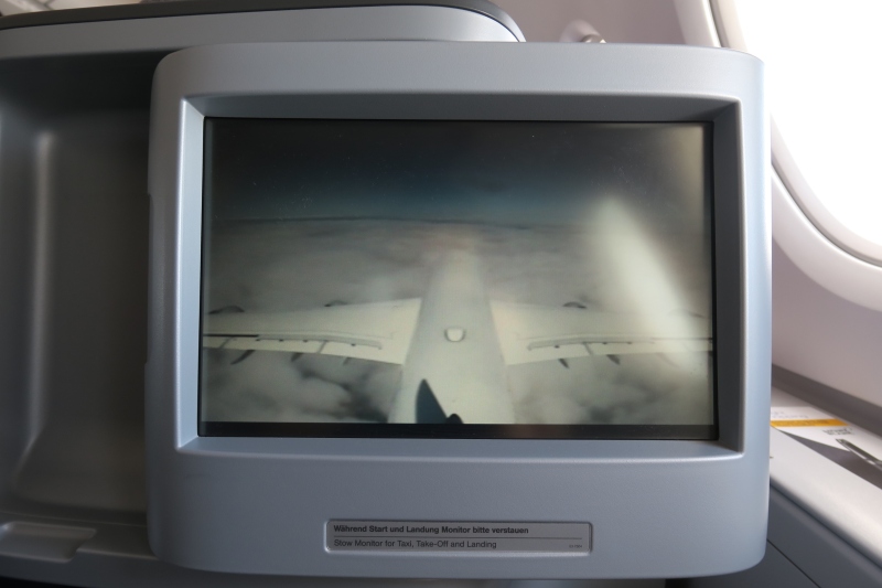 a screen with a plane wing on it