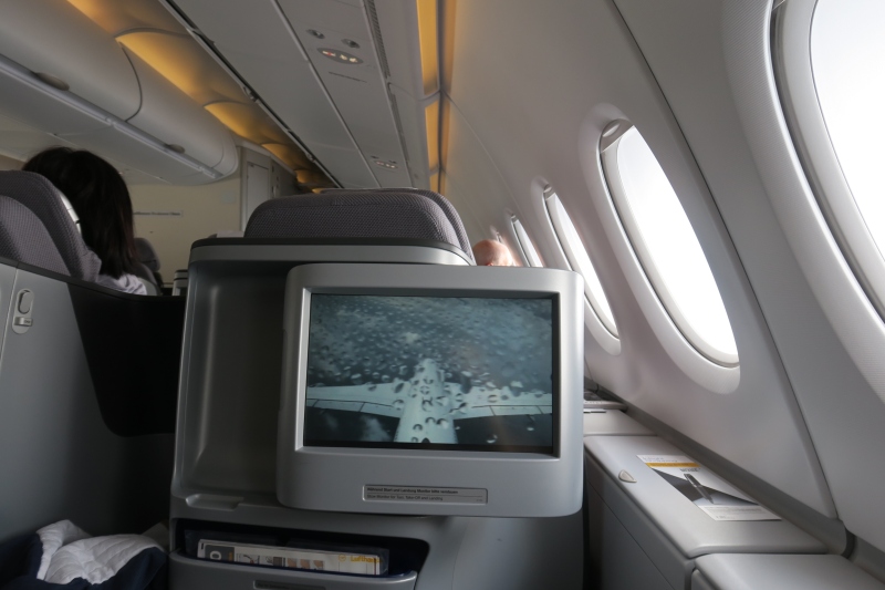 a television on the side of an airplane