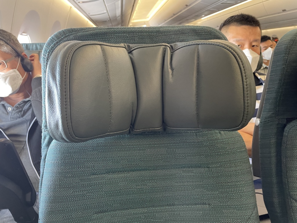 a man sitting in an airplane seat