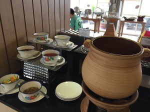a table with bowls and plates on it