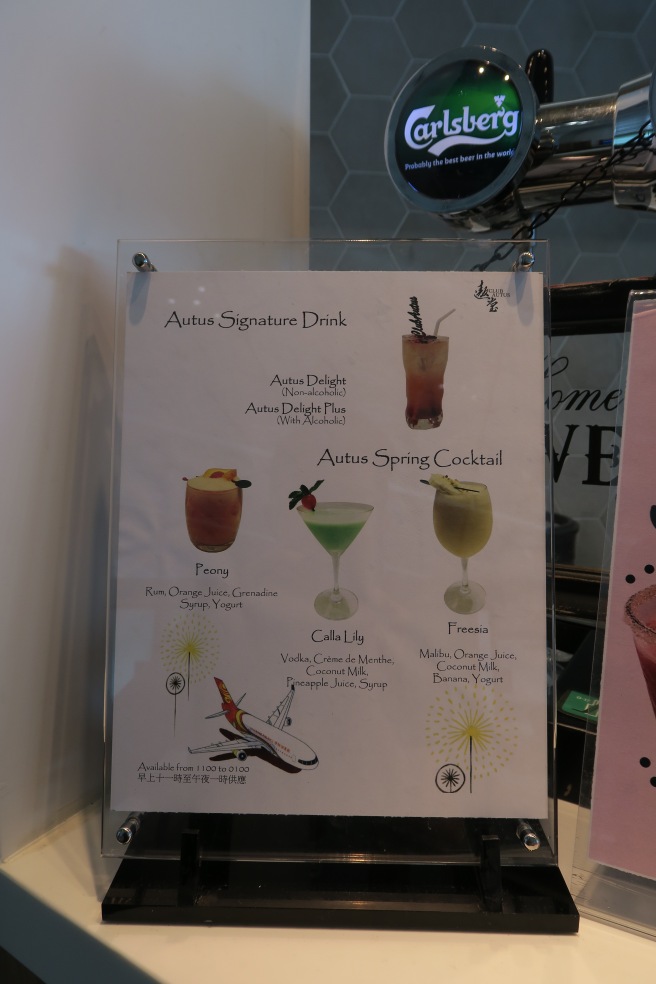 a menu board with drinks on it