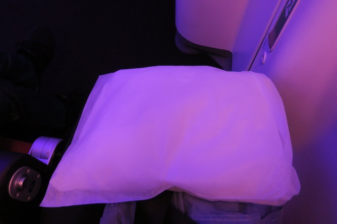 a white pillow on a plane