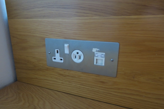 a wall outlet with a couple of plugs