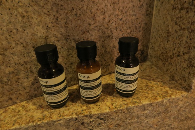 a group of small bottles on a counter