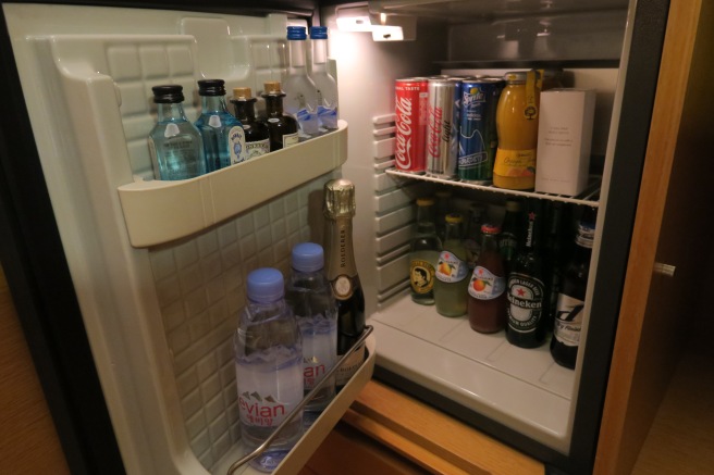 a mini fridge full of drinks