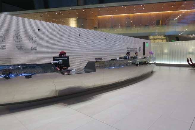 a reception desk in a lobby