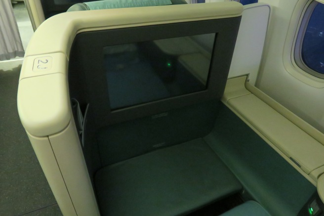 a seat with a screen on it