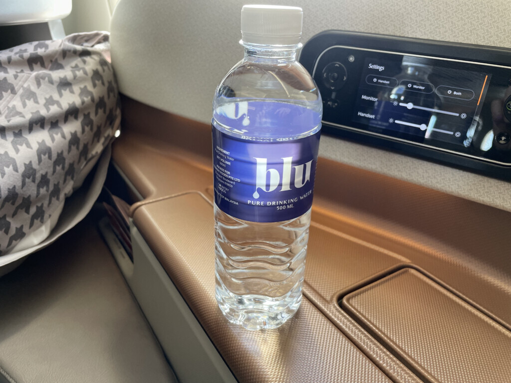 a bottle of water on a seat