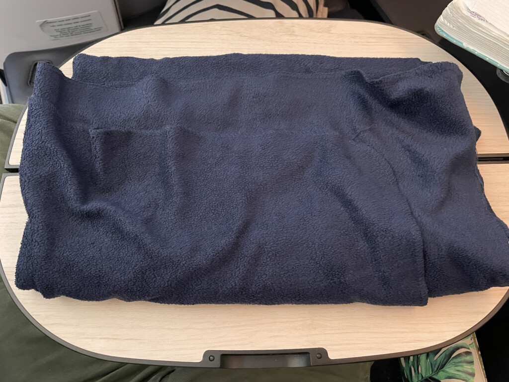 a blue blanket on a table