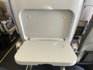 a white chair with a seat open