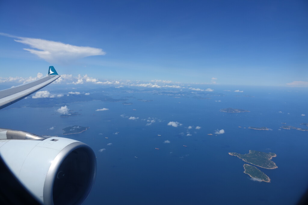 an airplane wing and an island