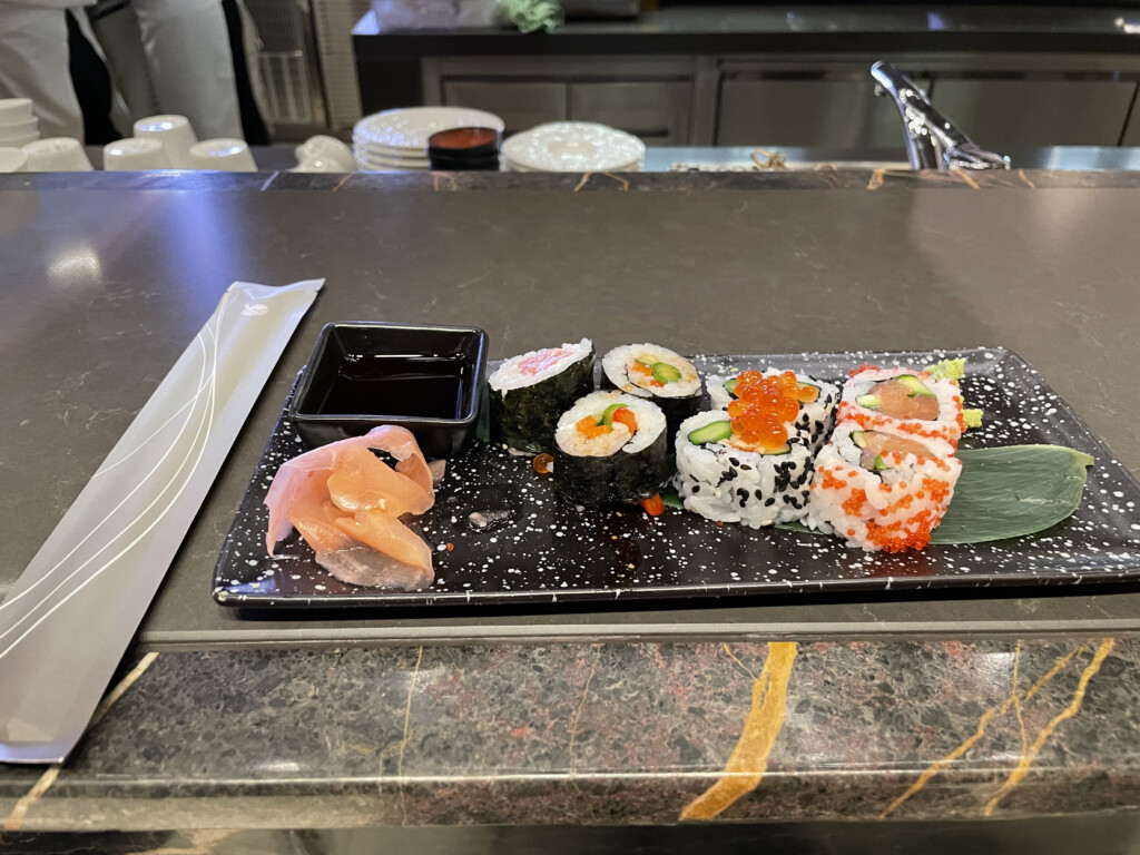 a plate of sushi on a counter