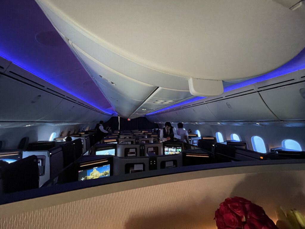 inside an airplane with seats and windows