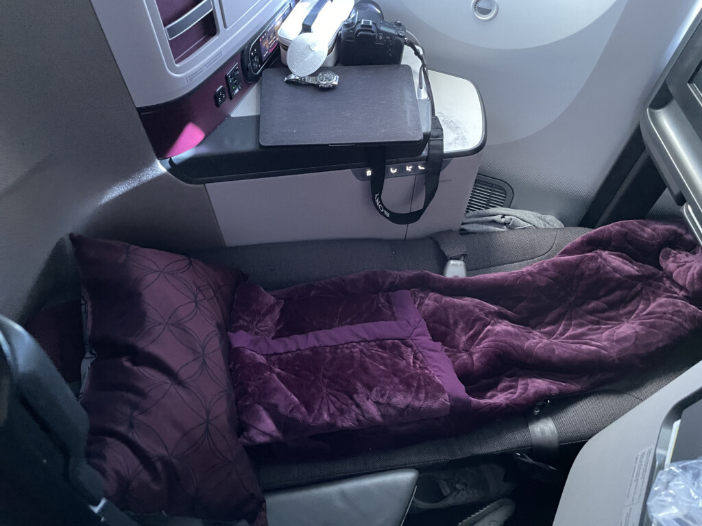 a sleeping bag on a seat