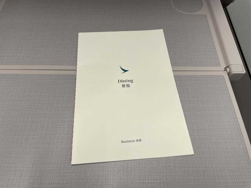 a white paper on a gray surface