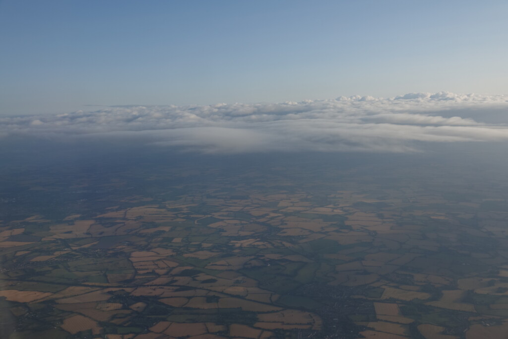 aerial view of clouds and land