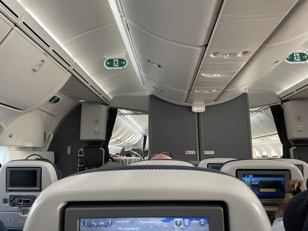 an airplane with a screen and a tv
