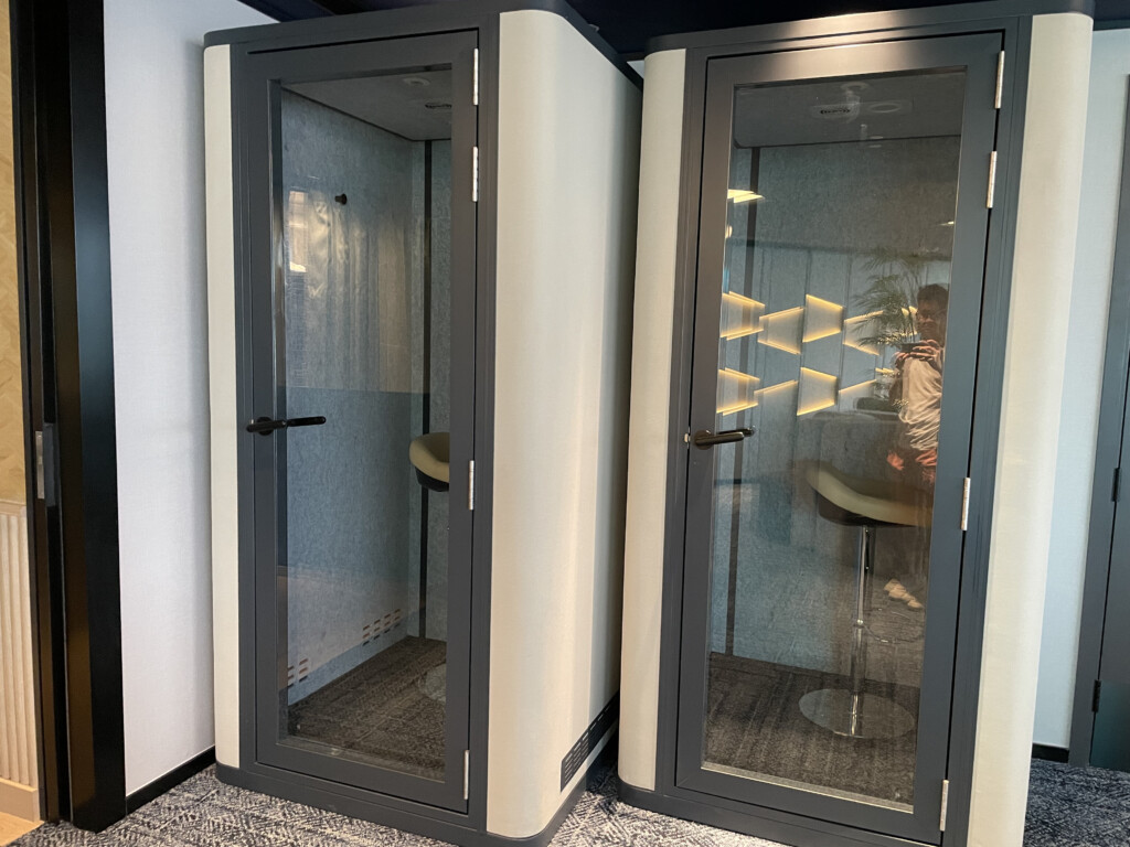 a two tall glass cabinets