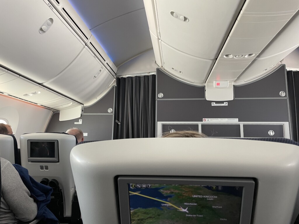 a screen on the back of an airplane