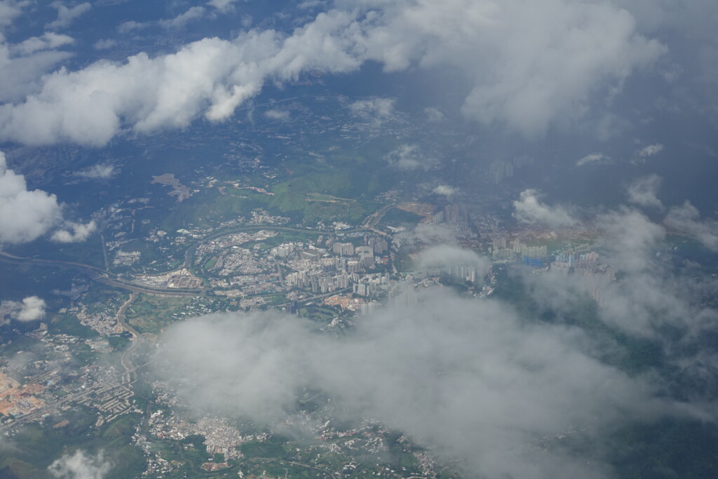 aerial view of a city and clouds