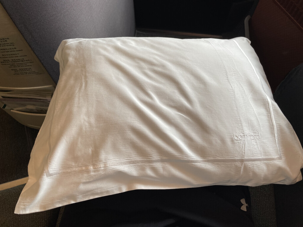 a white pillow on a couch