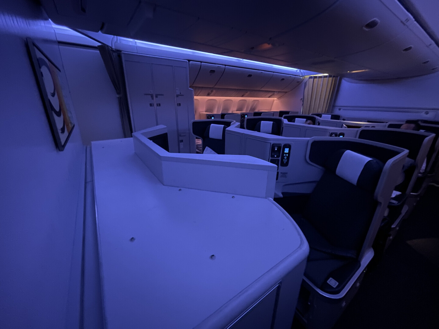an airplane with seats and a desk