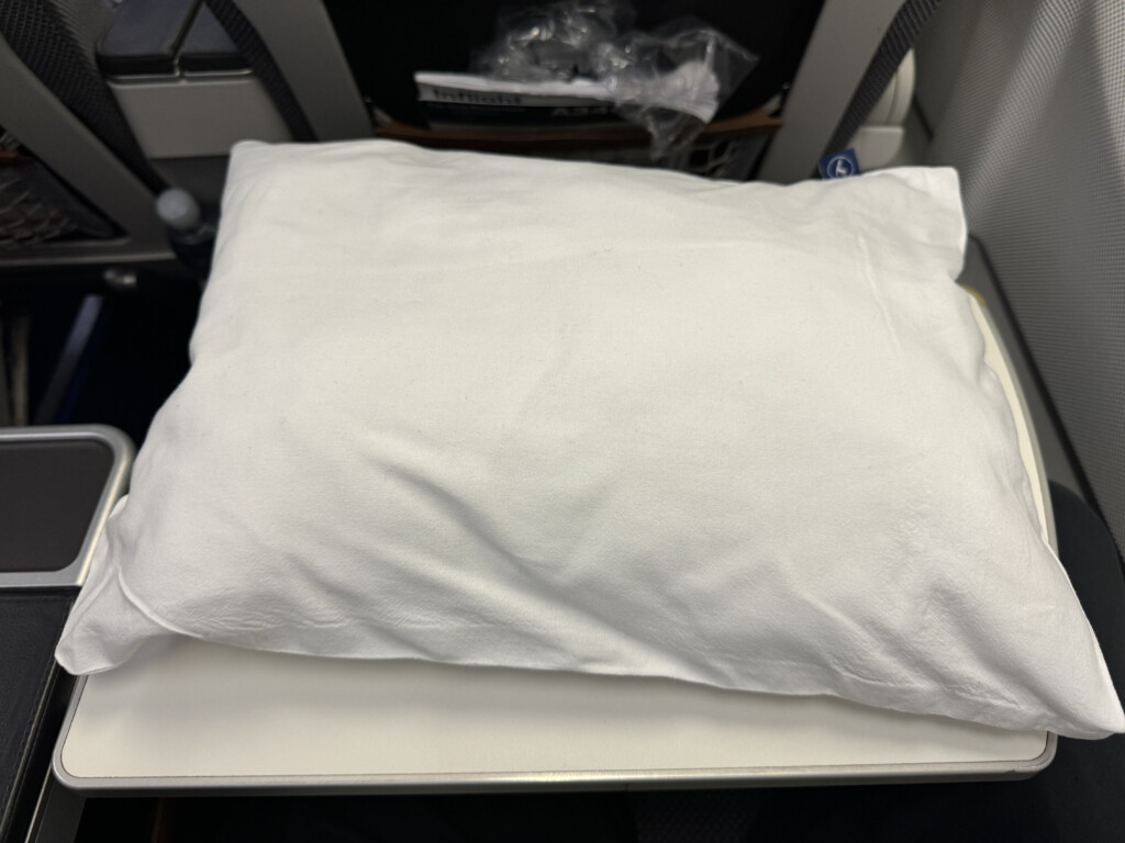 a white pillow on a table