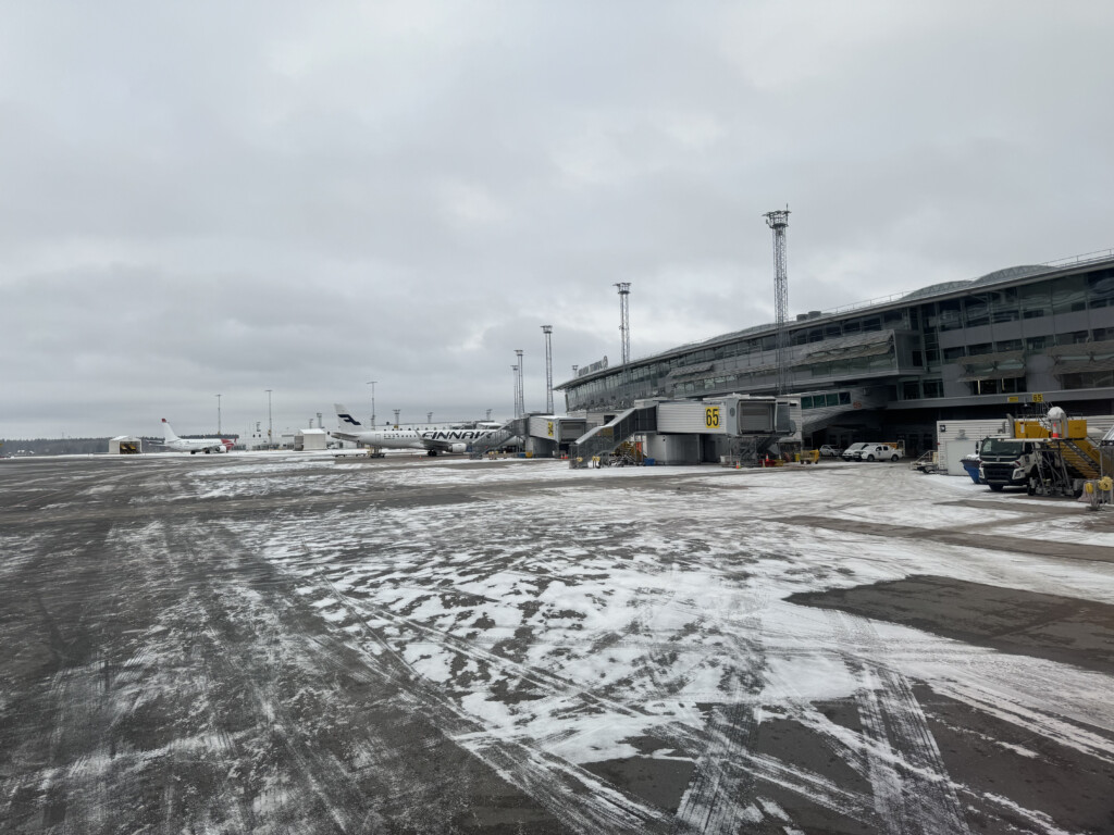 an airport with snow on the ground