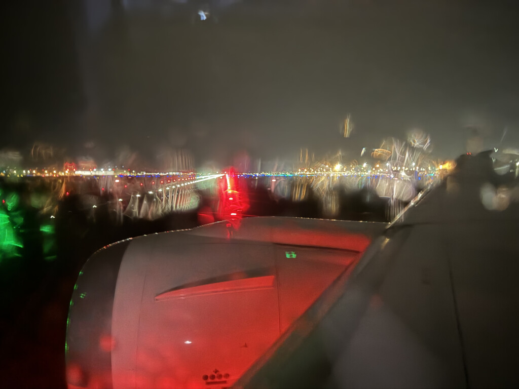 a view of a city from a window of a plane