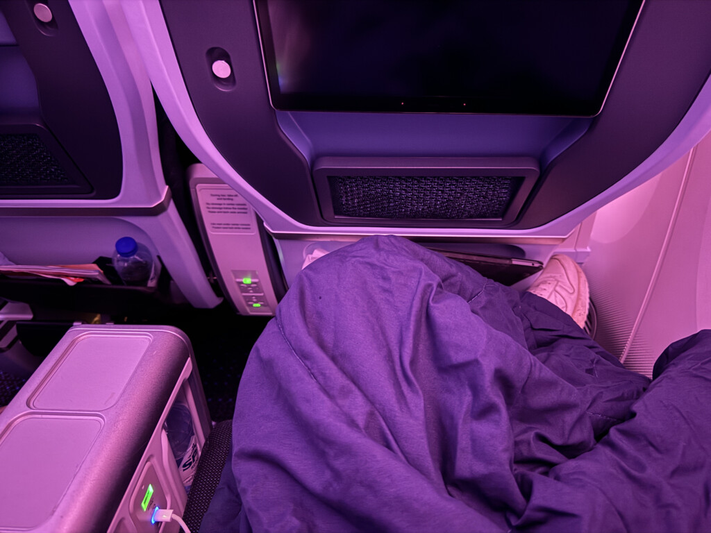 a person sleeping on an airplane