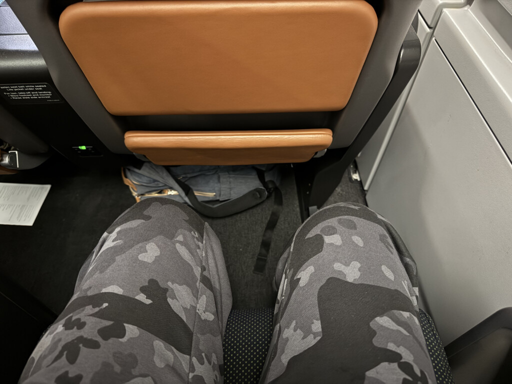 a person's legs in camouflage pants