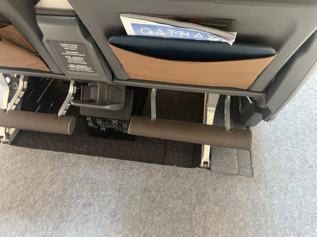 a seat with a magazine in it